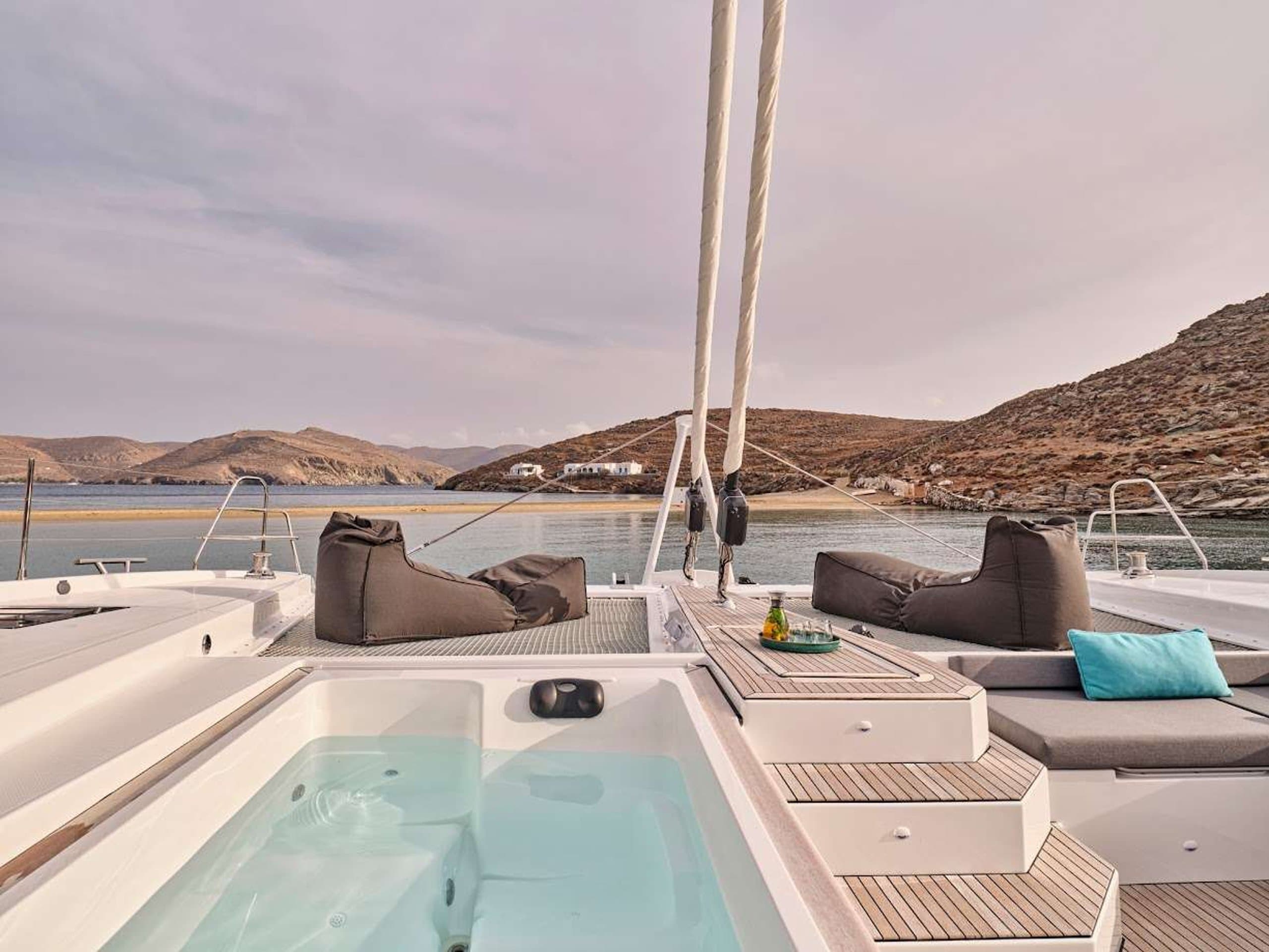 DOLLY - foredeck lounge with jacuzzi, beanbags and sun pads | Drivas Yachts