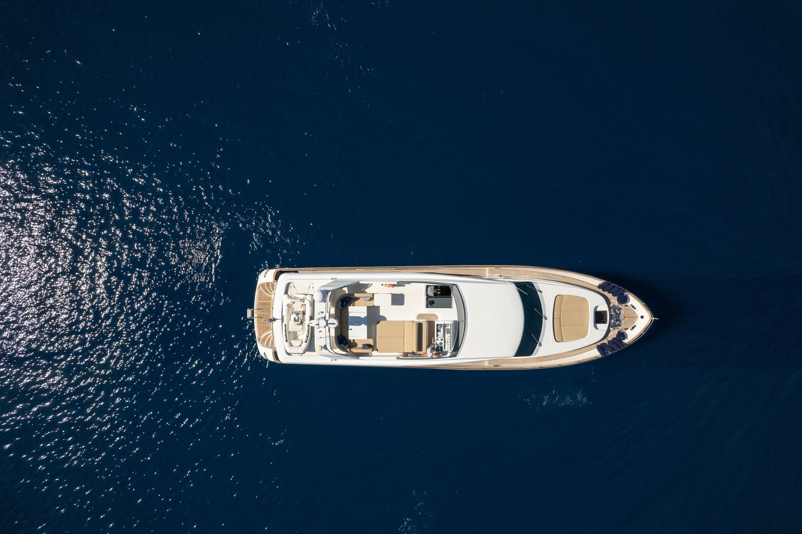 ALEGRIA - overhead aerial view of the motor yacht on dark blue water | Drivas Yachts