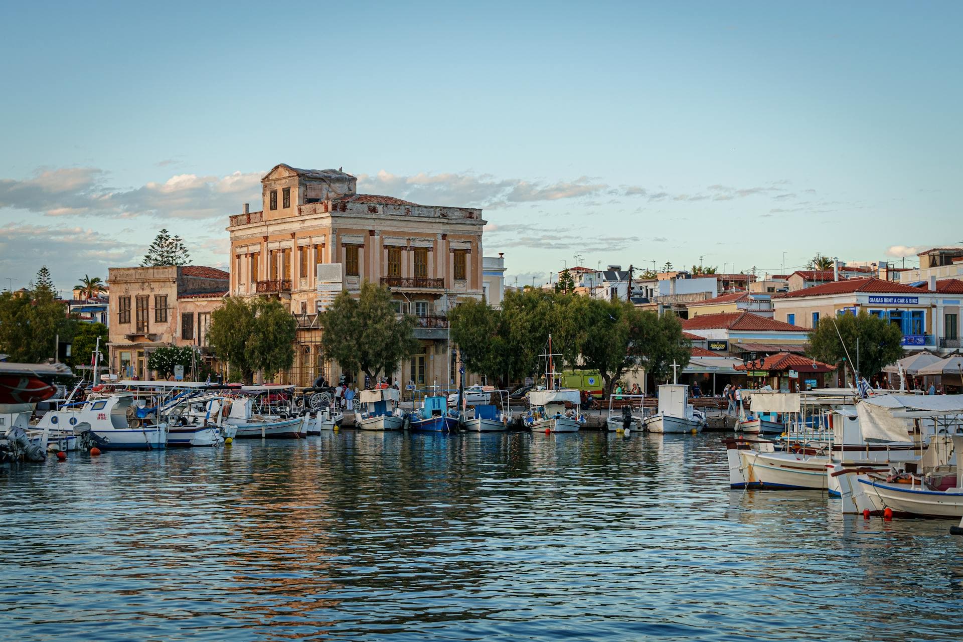 Aegina marina with fishing boats and the town behind