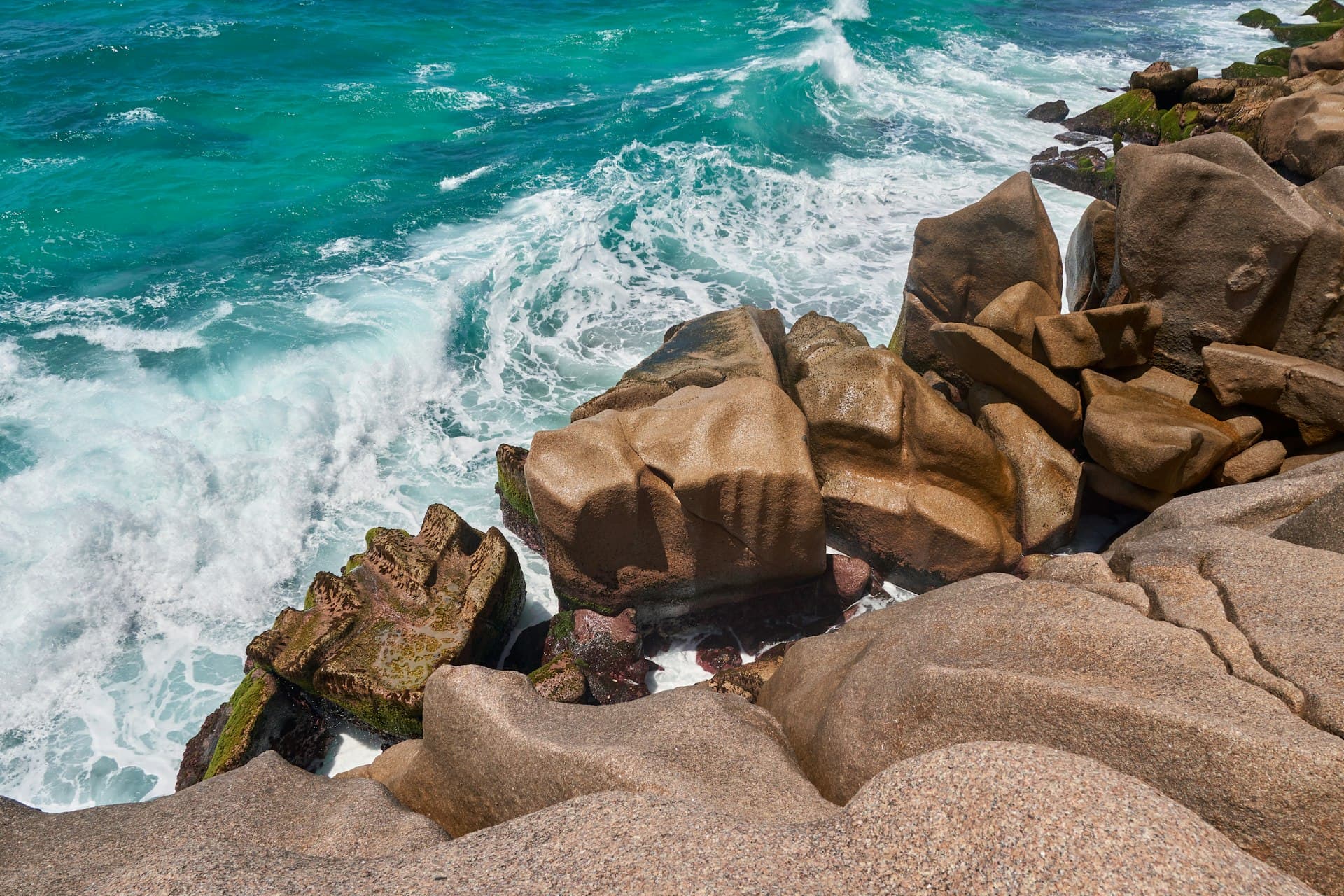 Indian Ocean island with granite boulders and palm trees
