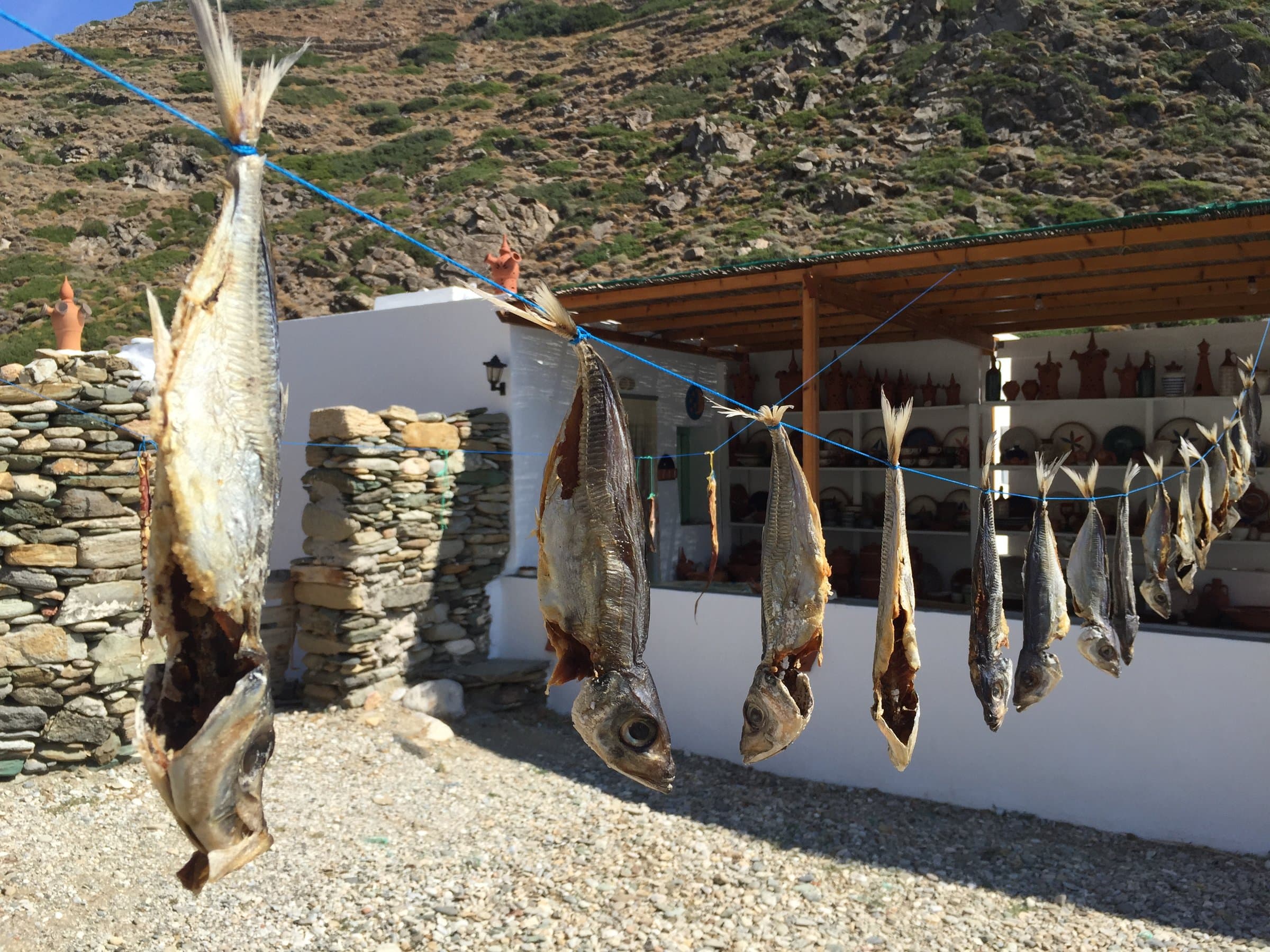 Fish drying in the sun outside a village house on Sifnos